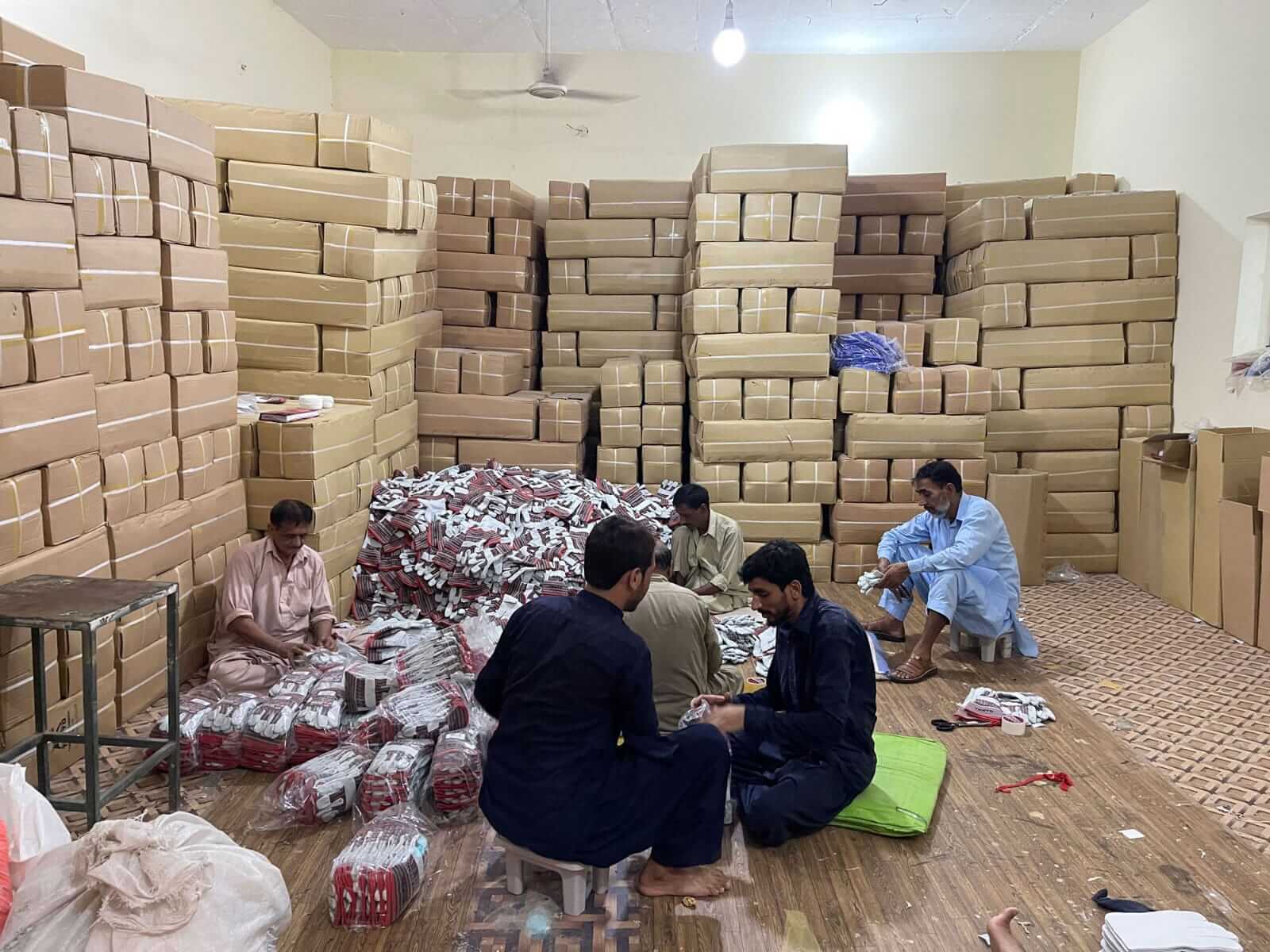 Finished leather products being packed for shipment