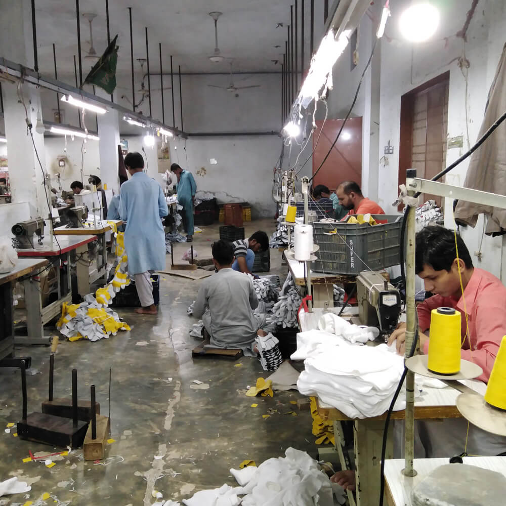 Skilled worker stitching leather products